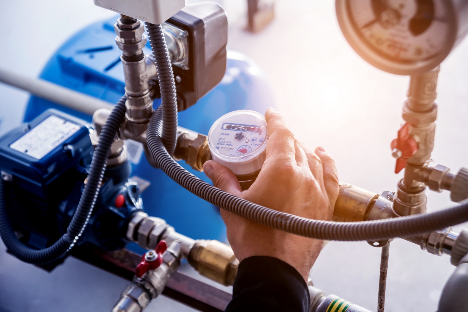 Technician checking water system nodes.Modern Industrial background